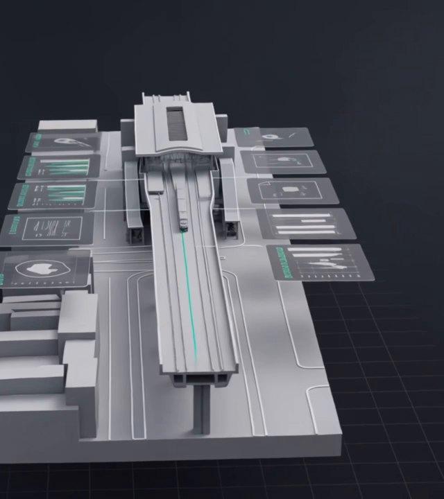 Clay model of a rail station seen from above, with records laid out beside it