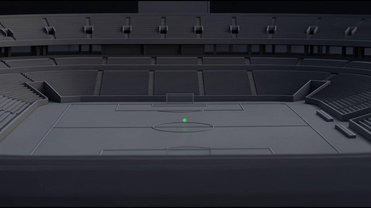 Clay model of a stadium pitch surrounded by stands